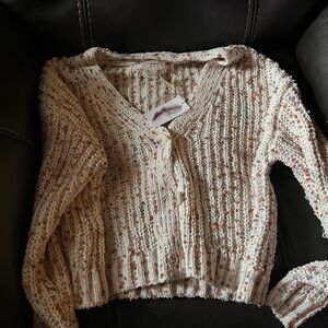 New with tag.Jessica Simpson cardigan.Button up size small. Brand new never worn